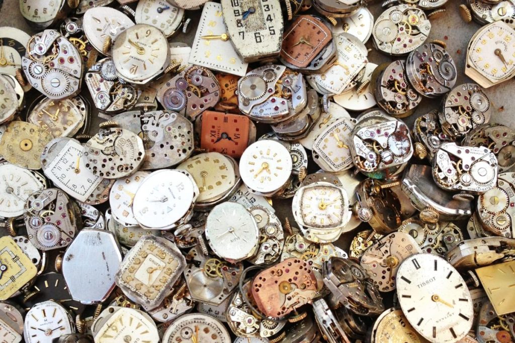 image of a pile of timekeeping devices